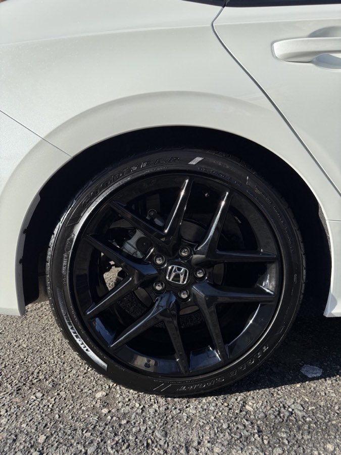 Gloss black Honda wheel and dressed tire